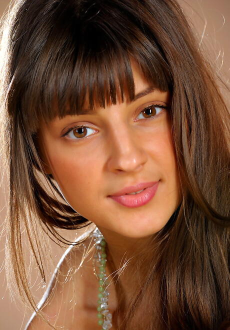 Hot dark hair young Melena A revealing small tits and spreading her legs 